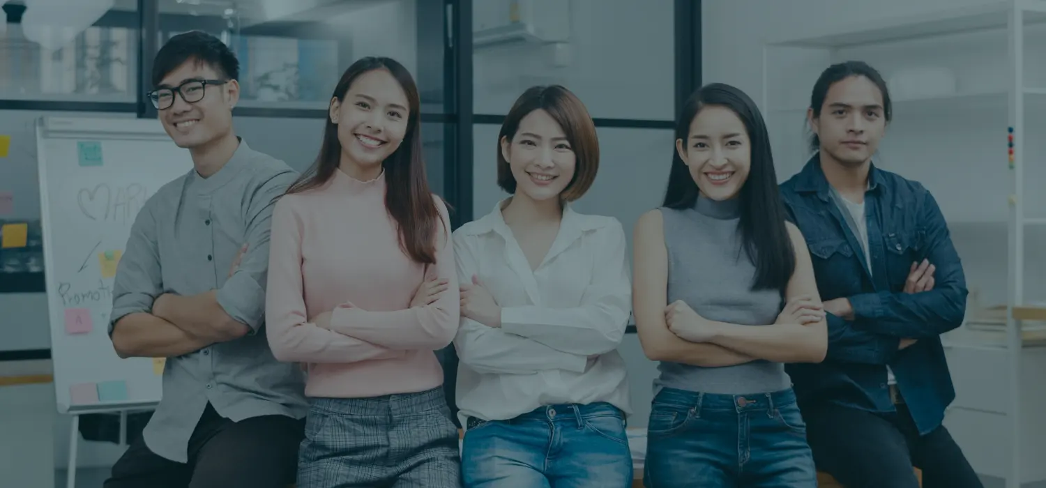 Group of professionals in an office, representing businesses across industries using AI voice solutions